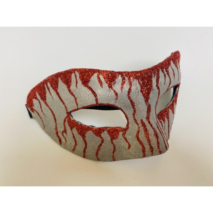 Silvery and bloody masquerade mask, decorated red lines. For Halloween, Party, Wedding